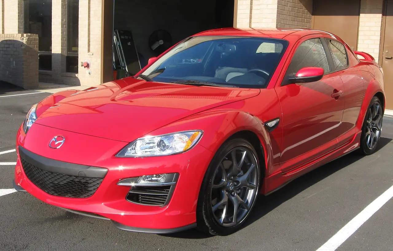 Red 2010 Mazda RX-8 (SE3P) Series 2, front three-quarter view
