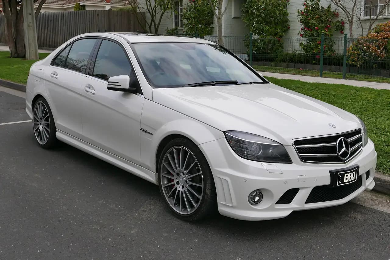 White 2009 Mercedes-Benz C 63 AMG Edition 63 sedan (W204), front three-quarter view