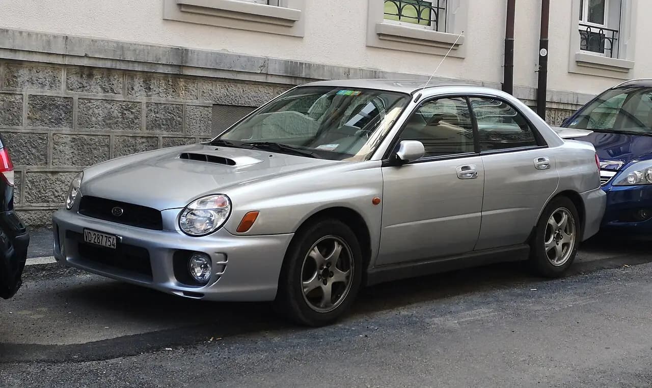 Silver Subaru Impreza WRX (GD bugeye) sedan, front three-quarter view