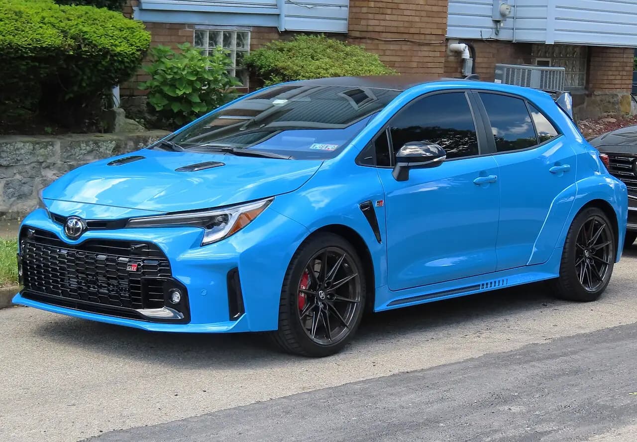Blue Flame 2024 Toyota GR Corolla Circuit Edition (GZEA14) hatchback, front three-quarter view