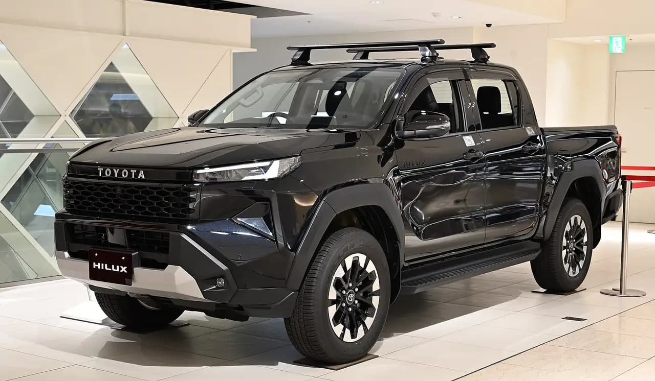 Black 2026 Toyota HiLux Z double cab (9th generation), front three-quarter view
