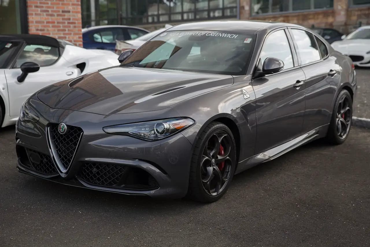 Grey 2018 Alfa Romeo Giulia Quadrifoglio (952) sedan, front three-quarter view