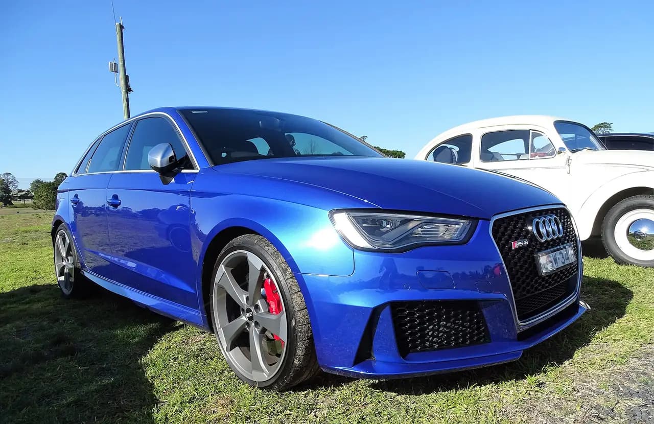Blue Audi RS3 Sportback (8V, pre-facelift), front three-quarter view