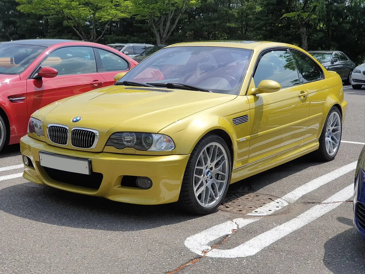 Phoenix Yellow BMW M3 coupe (E46), front three-quarter view
