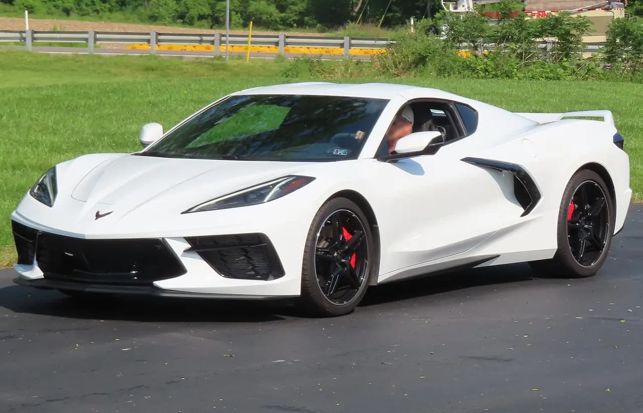 White 2023 Chevrolet Corvette Stingray coupe (C8), front three-quarter view