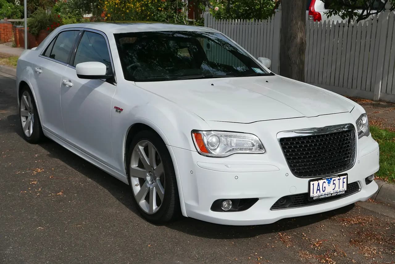 White 2013 Chrysler 300 SRT8 sedan (LD), front three-quarter view