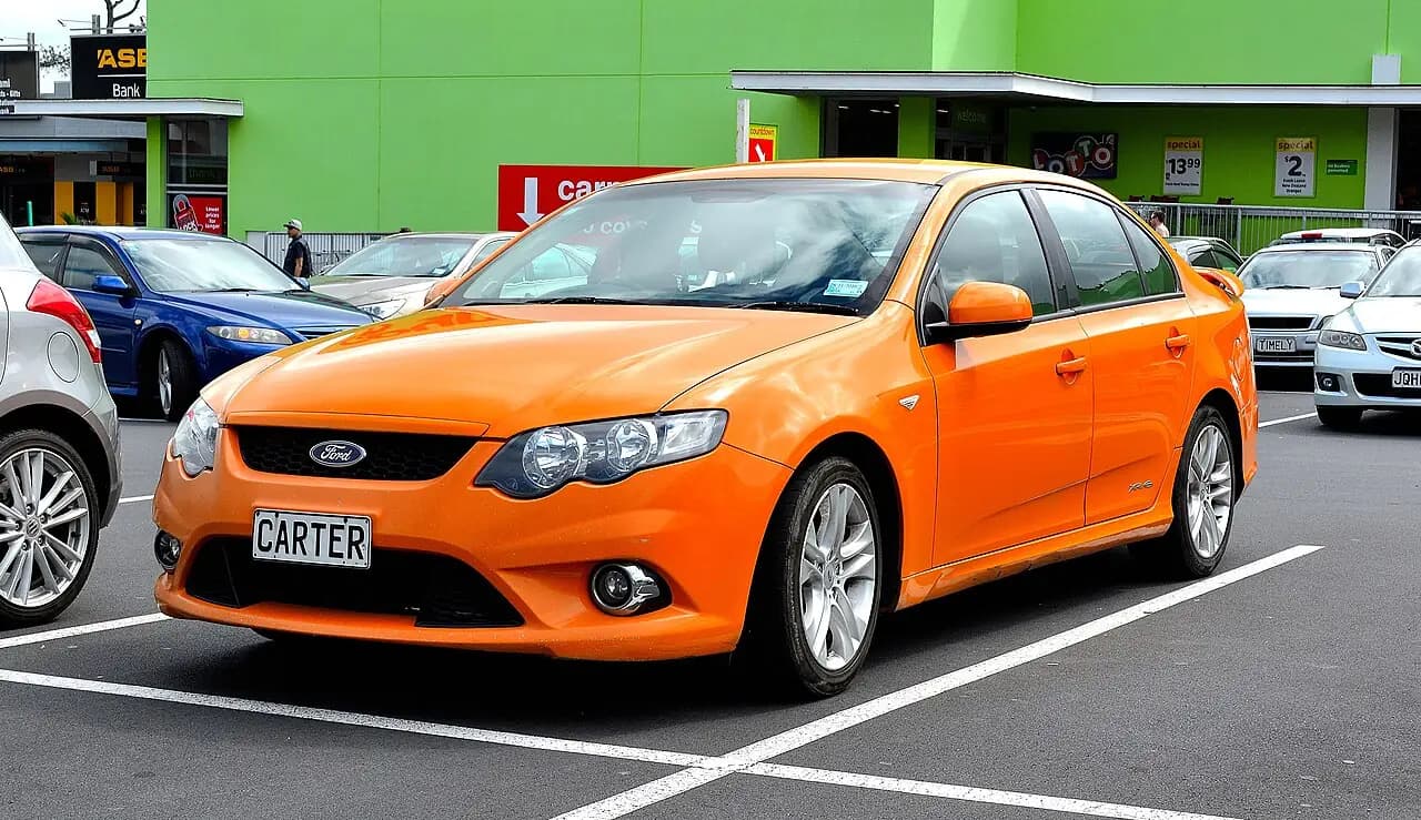 Orange 2009 Ford Falcon XR6 (FG) sedan, front three-quarter view