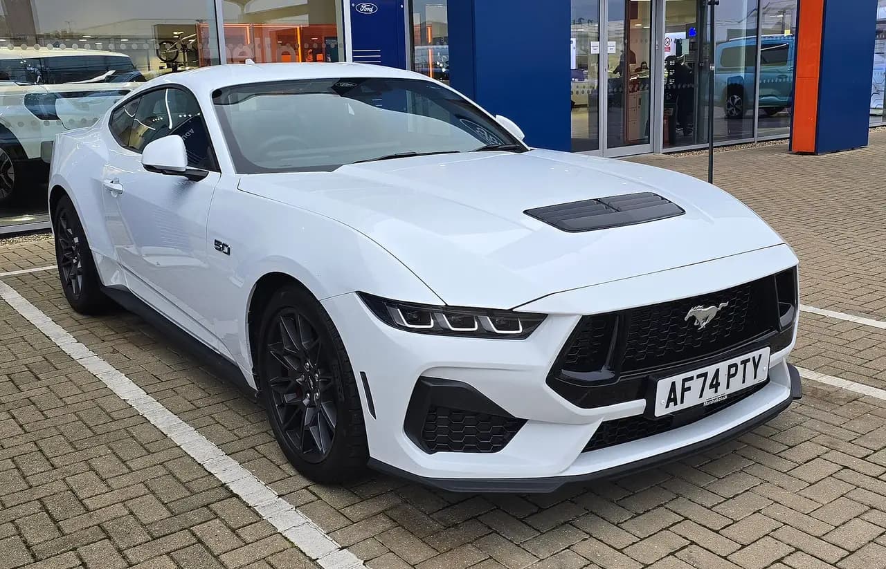 White 2024 Ford Mustang GT Fastback (S650), front three-quarter view