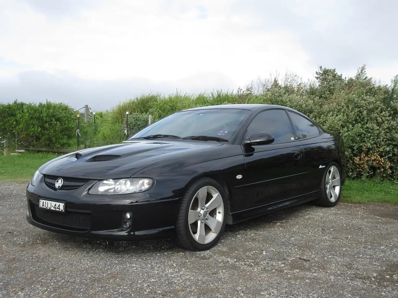 Black 2005 Holden Monaro (V2, VZ series) coupe, front three-quarter view
