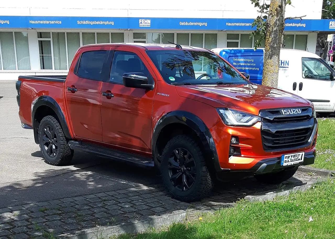 Orange Isuzu D-Max V-Cross (RG) crew cab ute, front three-quarter view