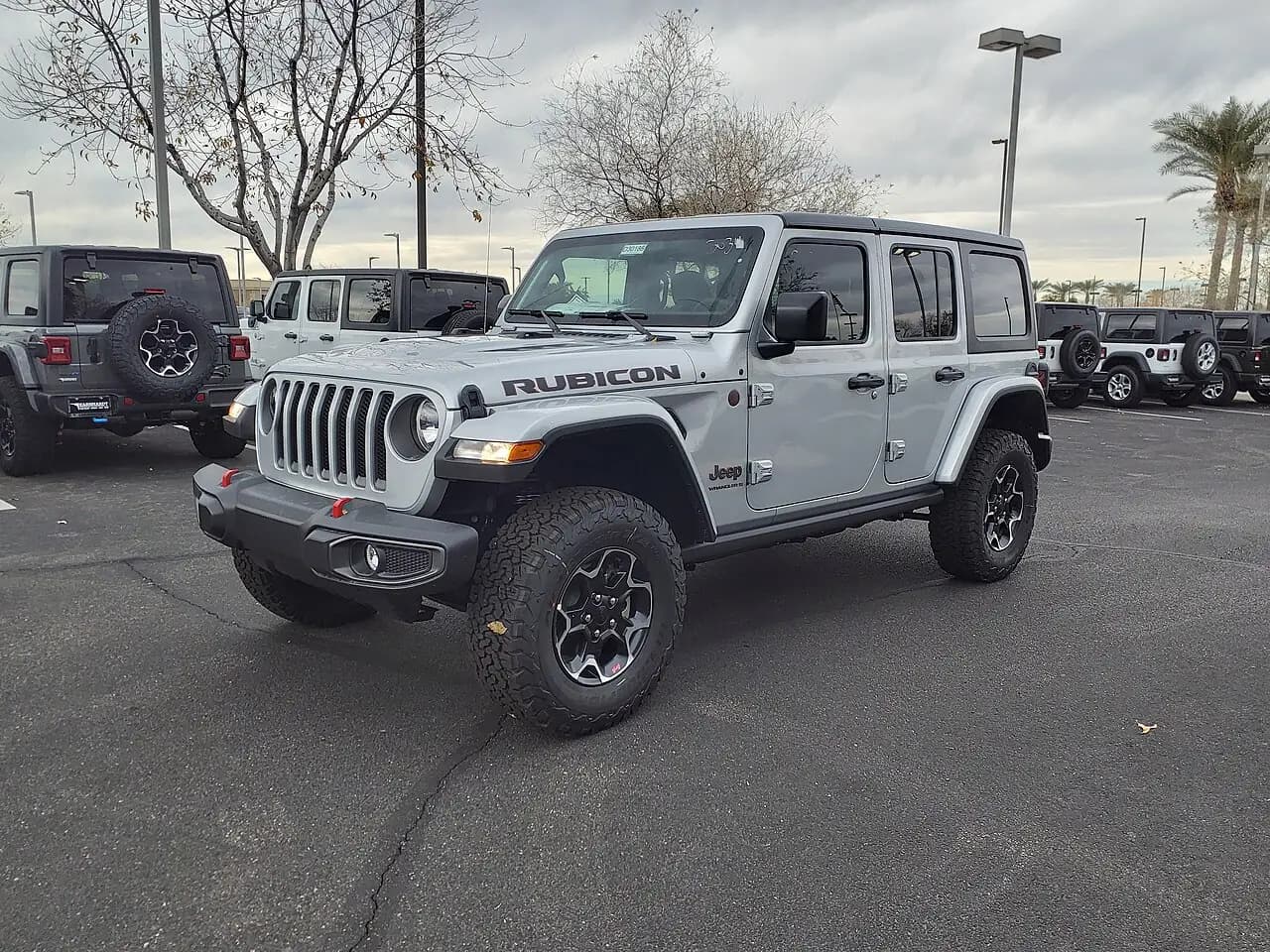 Silver 2023 Jeep Wrangler Unlimited Rubicon (JL) 4-door, front three-quarter view