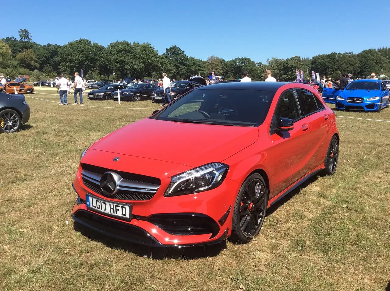 Red 2017 Mercedes-AMG A 45 4MATIC hatchback (W176 facelift), front three-quarter view
