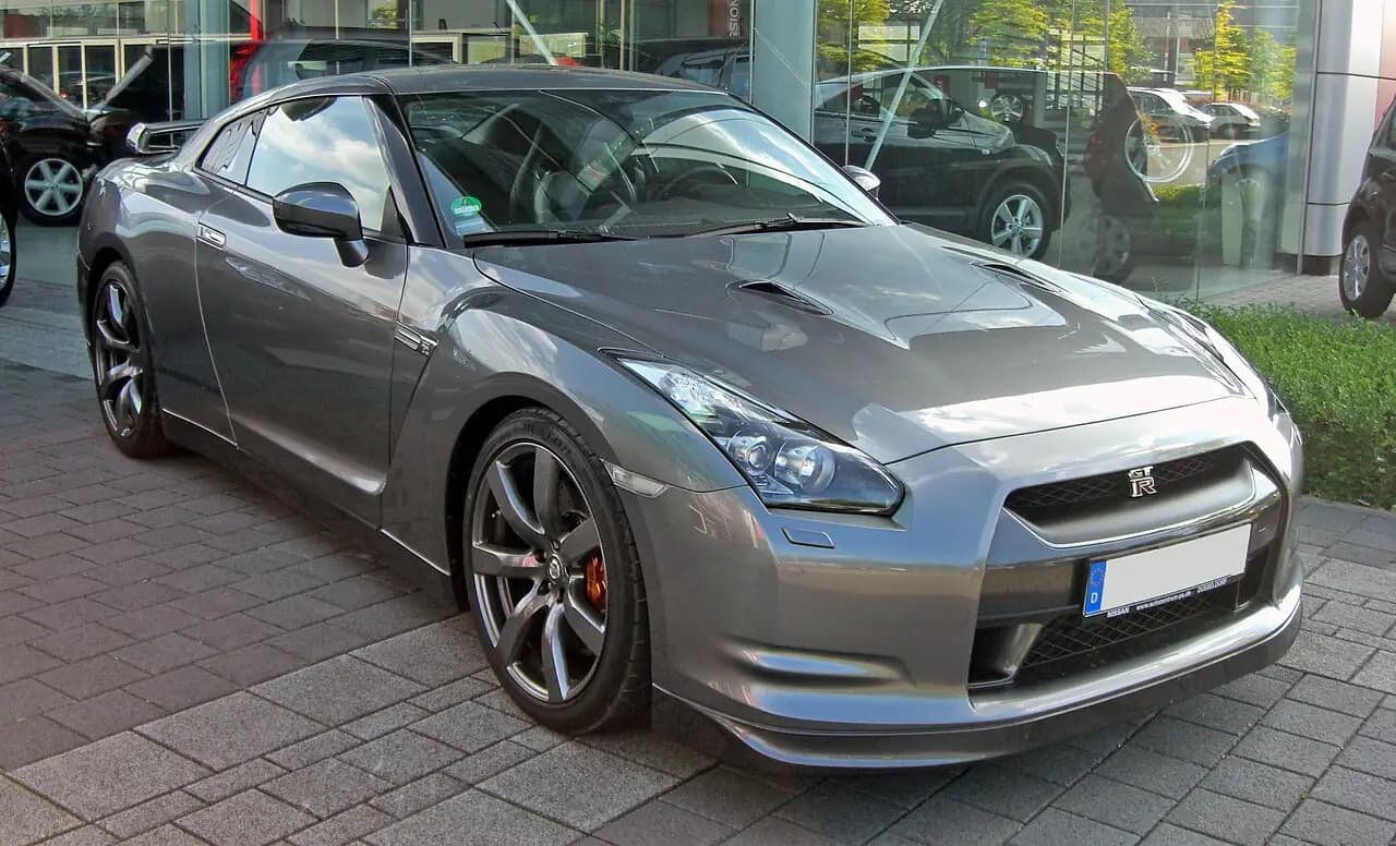 Grey 2009 Nissan GT-R (R35 CBA) coupe, front three-quarter view