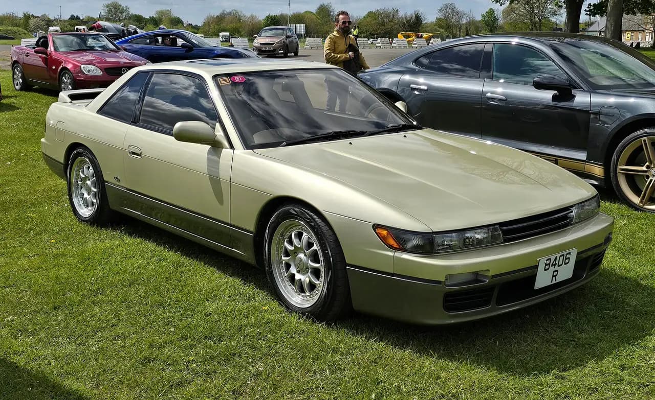Champagne two-tone 1993 Nissan Silvia (S13) coupe, front three-quarter view
