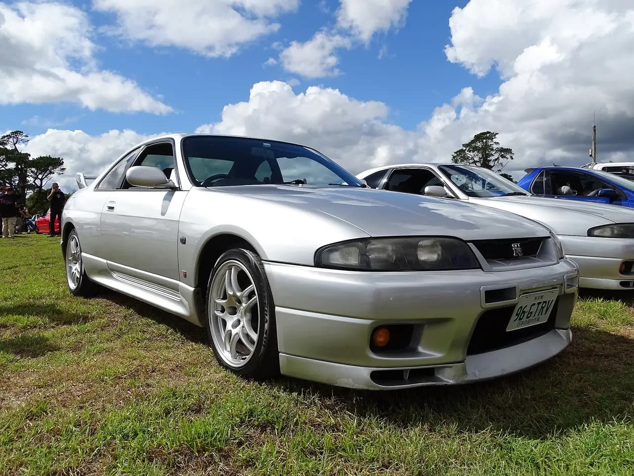 Silver 1996 Nissan Skyline GT-R V-Spec (R33) coupe, front three-quarter view