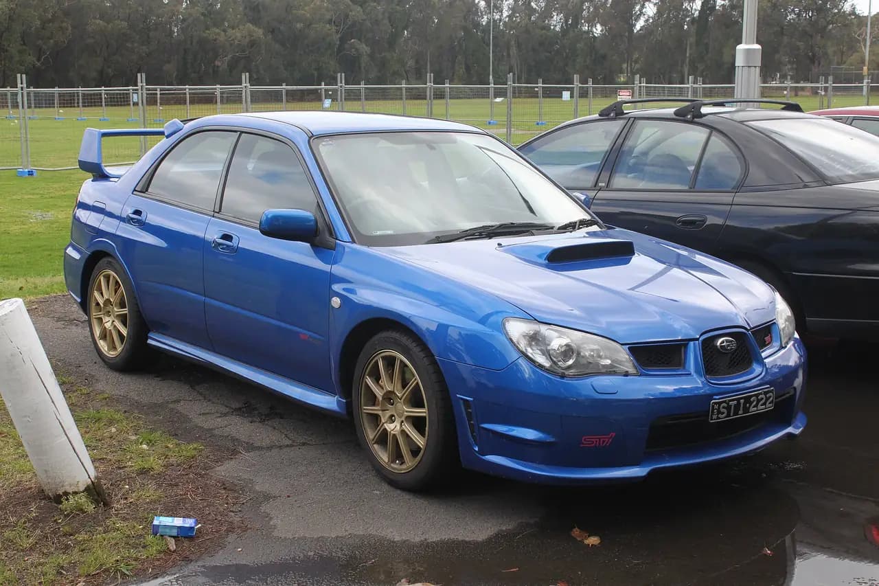 WR Blue 2006 Subaru Impreza WRX STI sedan (GD), front three-quarter view
