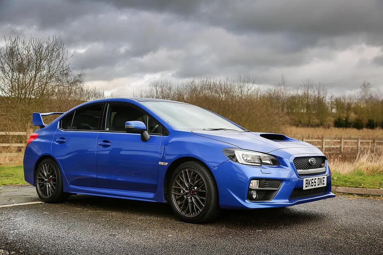 WR Blue 2015 Subaru WRX STI (VA) sedan, front three-quarter view