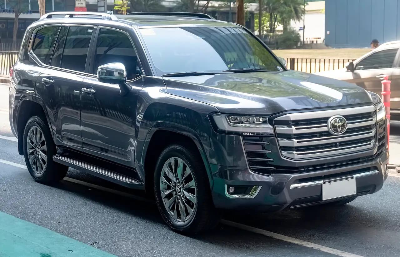 Grey Toyota LandCruiser 300 Series ZX (FJA300, 3.3 V6 diesel), front three-quarter view
