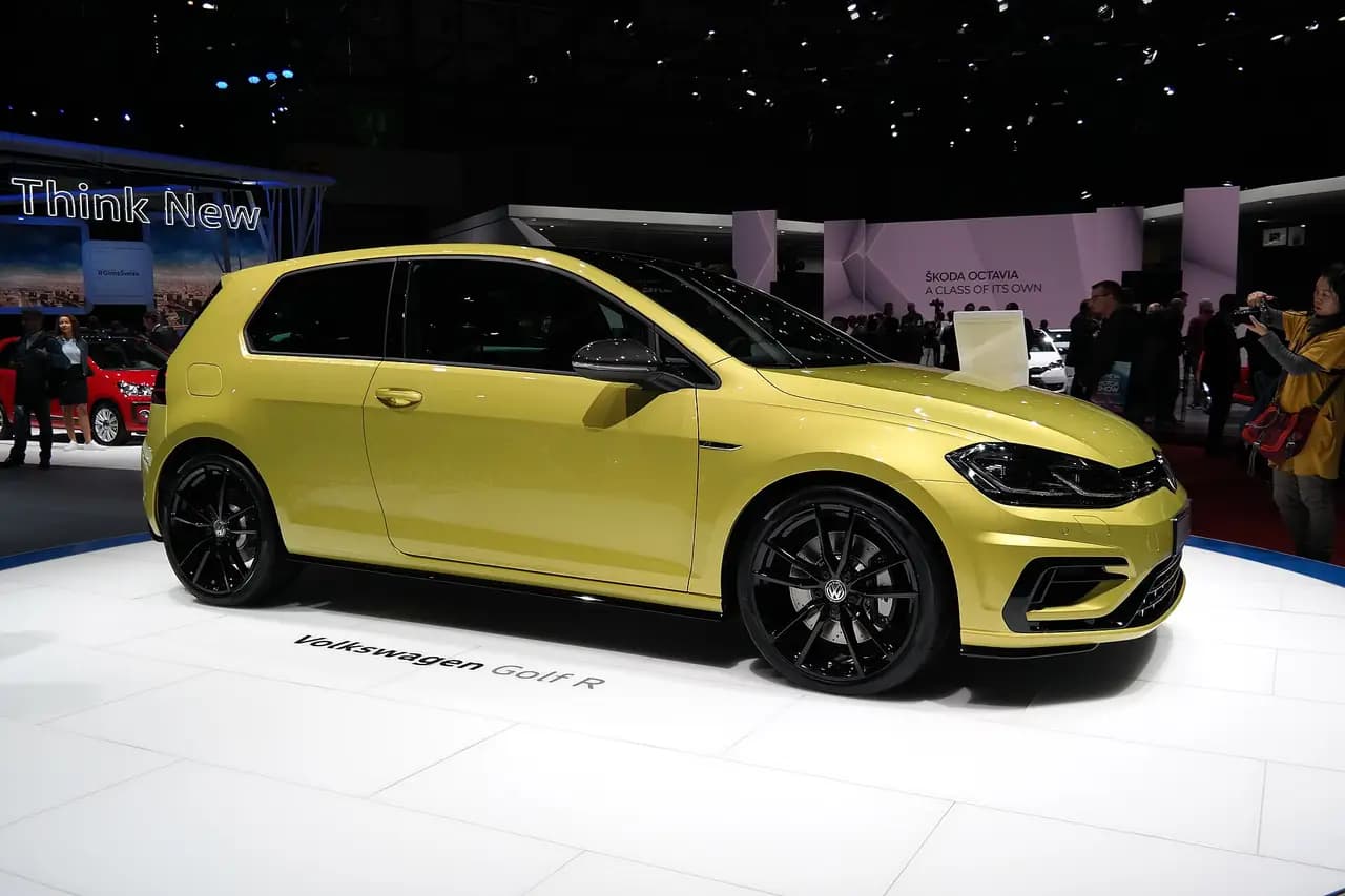 Yellow 2017 Volkswagen Golf R (Mk7.5) three-door hatchback, front three-quarter view